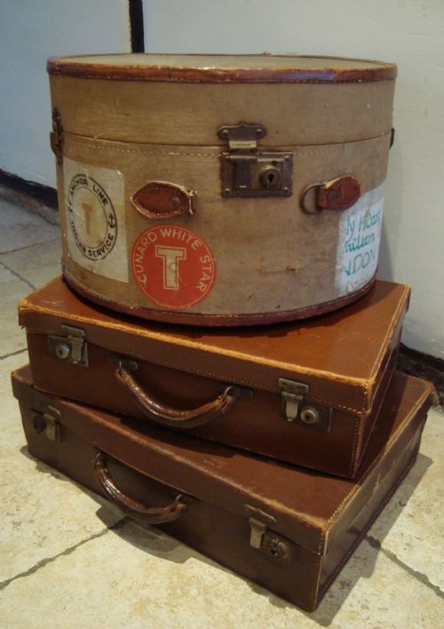 vintage leather bound suit cases travel luggage