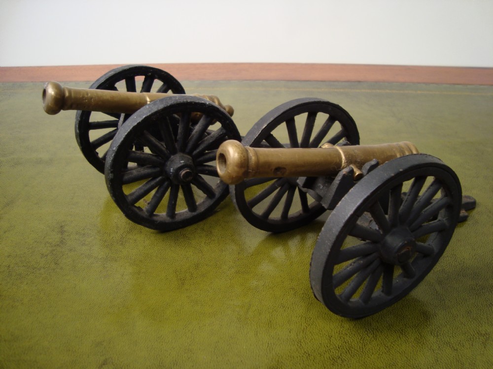 a decorative pair of desktop cannons