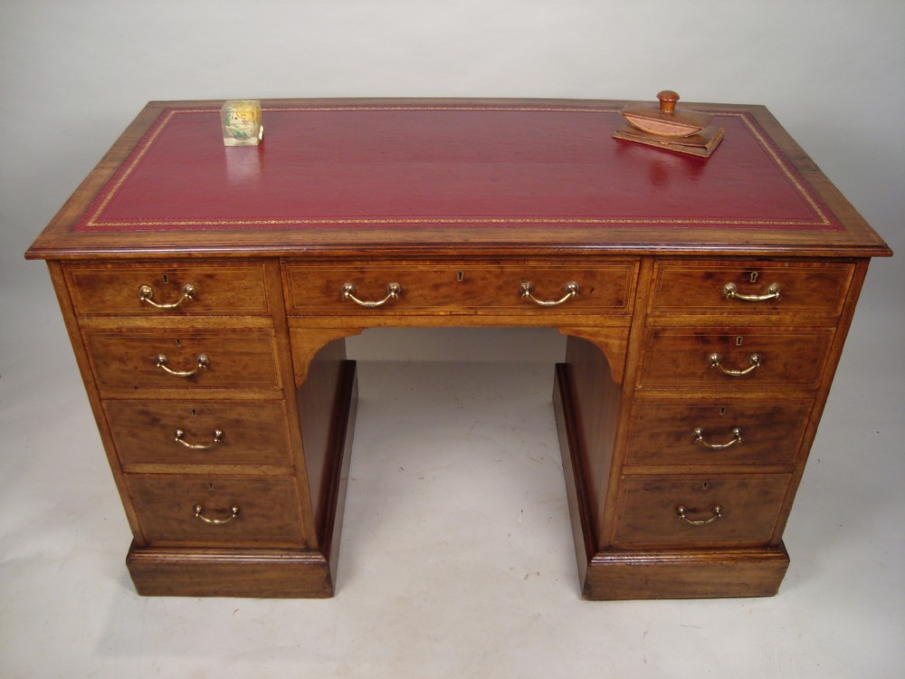 a handsome walnut pedestal desk c1900