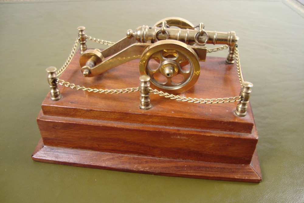 a decorative cannon on plinth