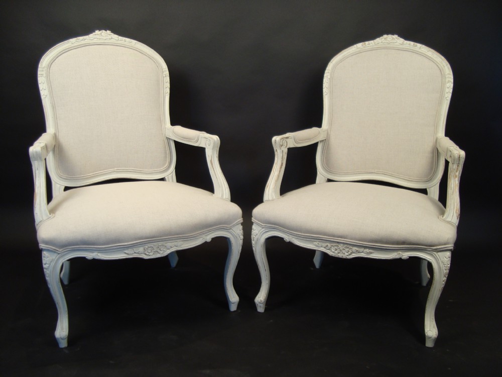 a pair of 19 century french painted chairs