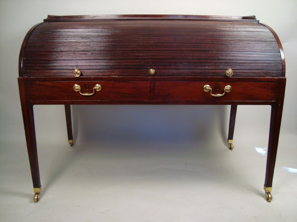 an extremely handsome roll top desk 18th century