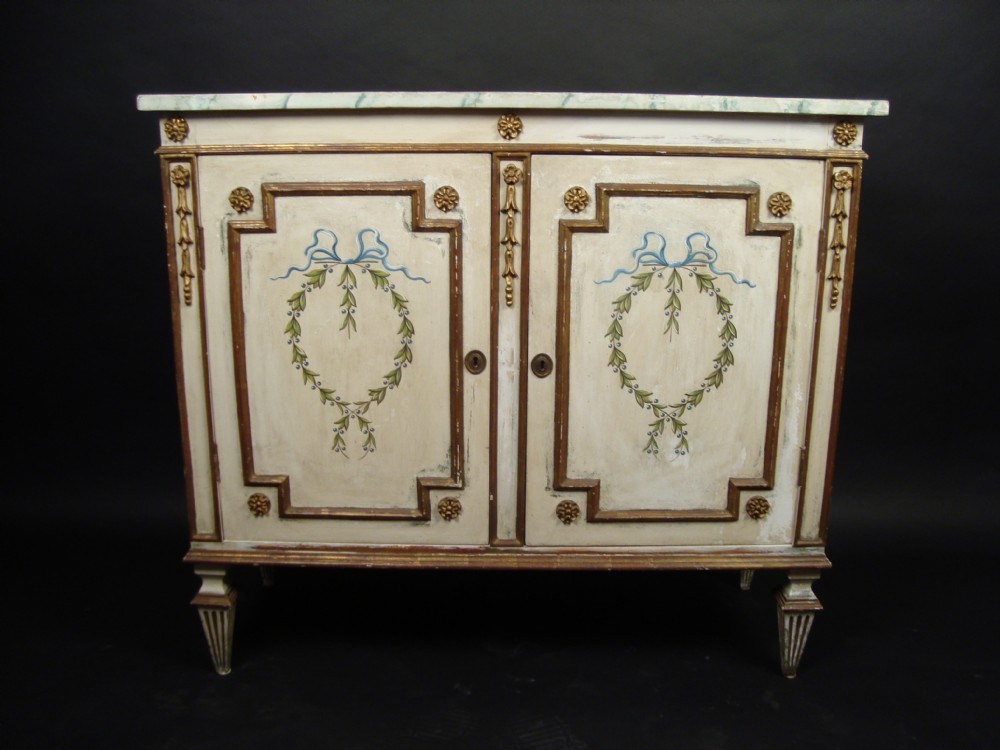 a decorative louis xvi style parcel gilt side cabinet