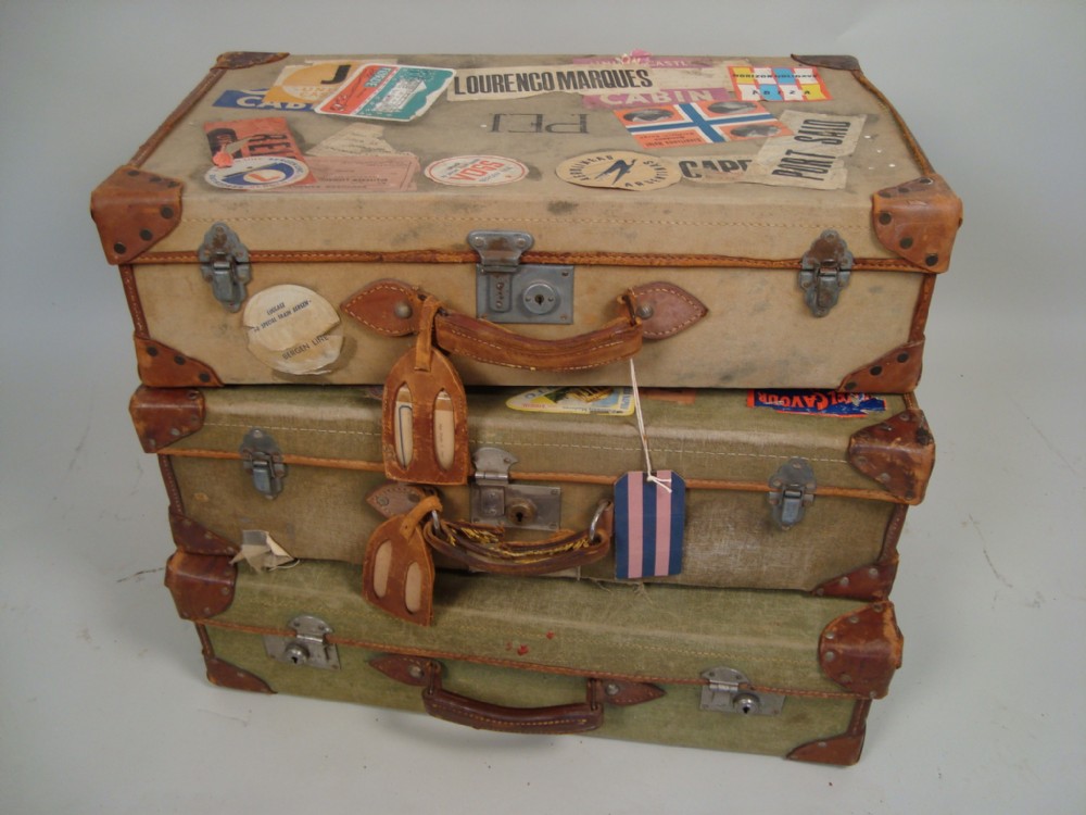 a vintage set of suitcases luggage