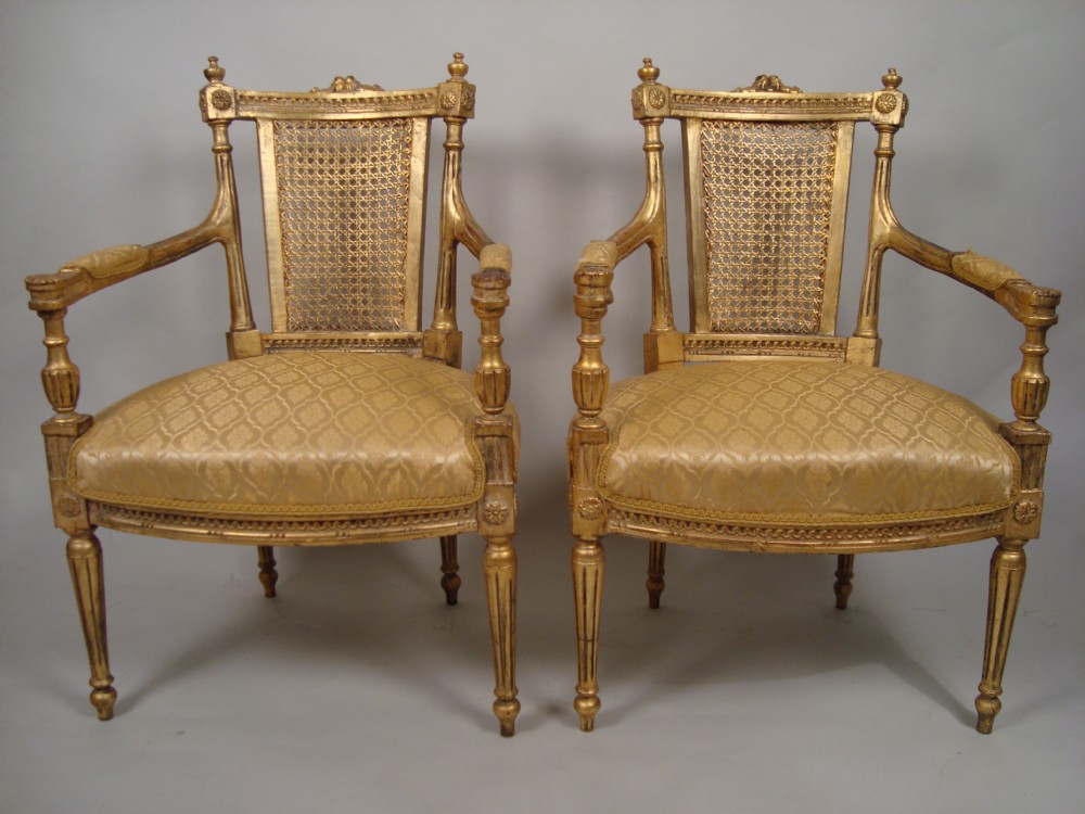 a pair of louis xvi style giltwood fauteuils circa 1860