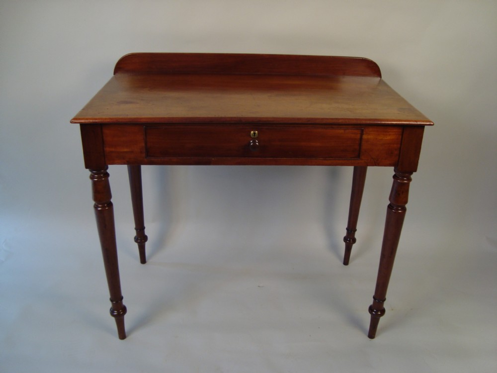 an elegant victorian mahogany writingside table