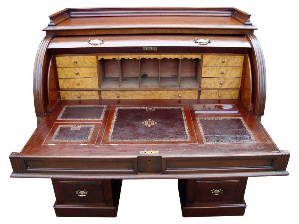 an imposing victorian cylinder roll top desk