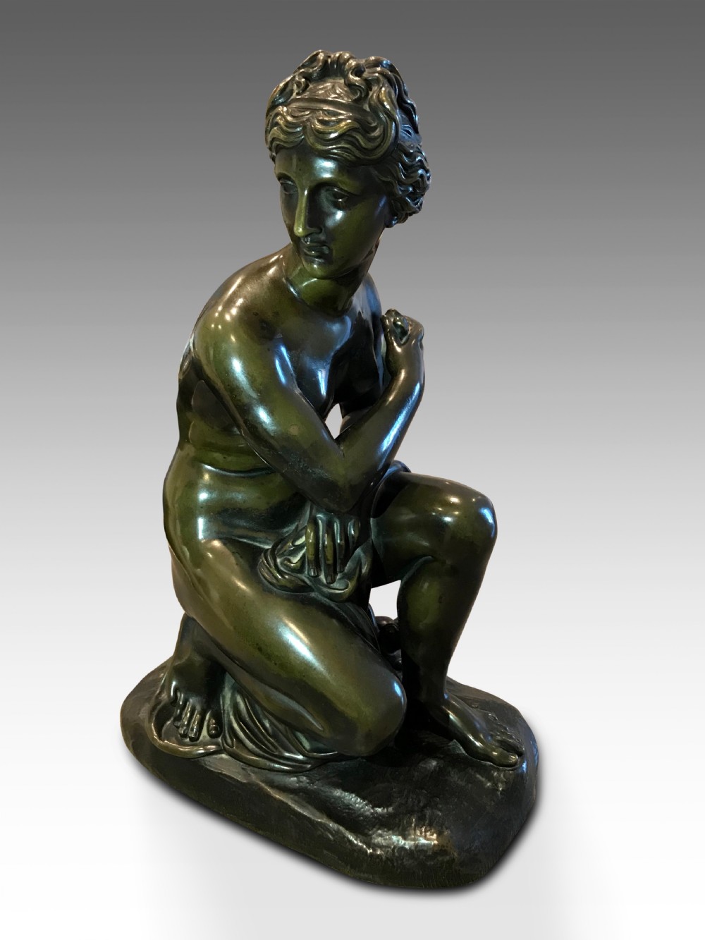 a rare victorian example of kneeling venus in bronze