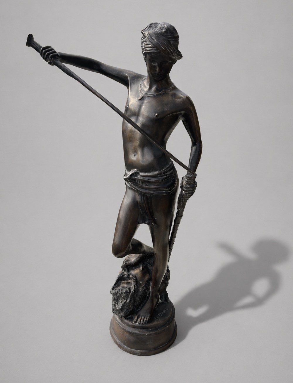 a statue by a mercie of david and goliath