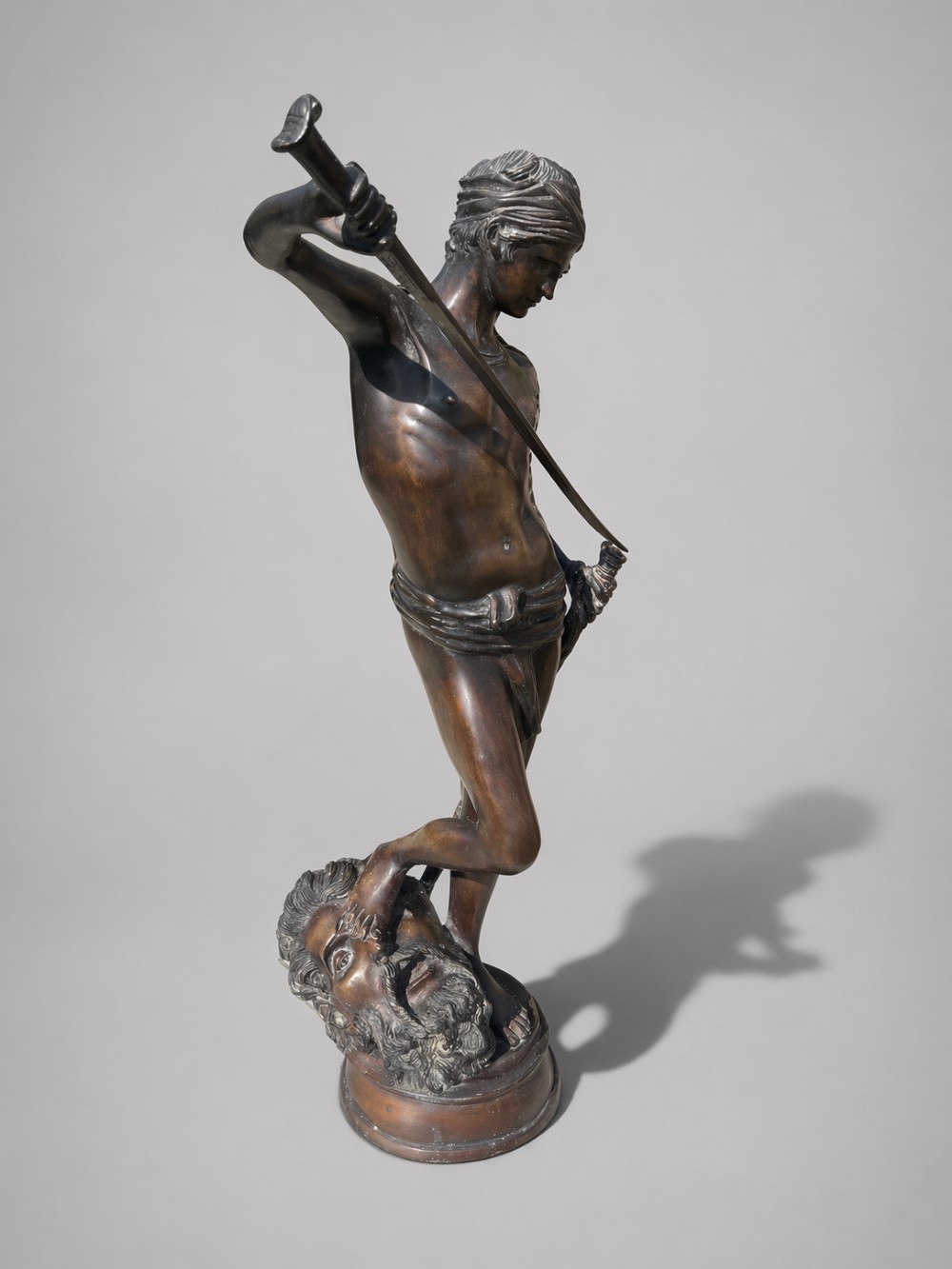 a statue by a mercie of david and goliath